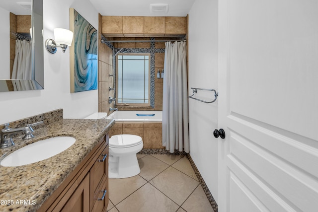 5435 E Cambridge Ave, Phoenix, AZ 85008 - full bathroom with tile patterned flooring, tiled shower / bath combo, and vanity