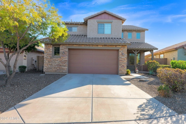 view of front of house with a garage