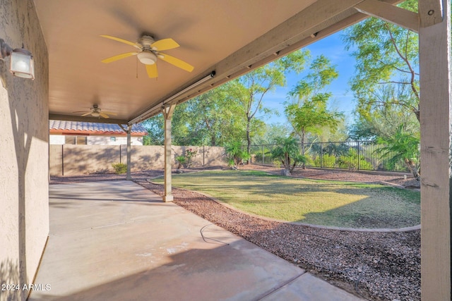 view of patio featuring ceiling fan