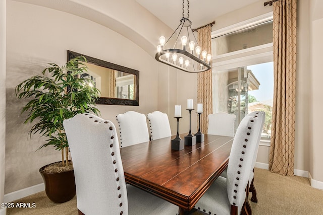 view of carpeted dining area