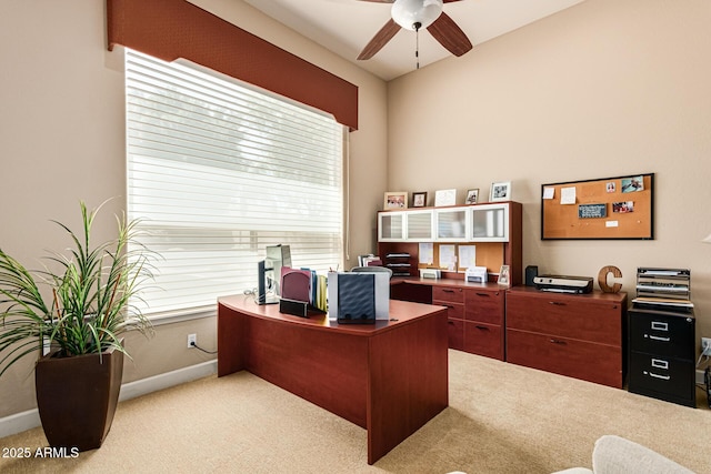 office area featuring ceiling fan and light colored carpet