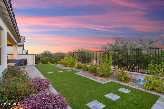 view of yard featuring a patio area and a fenced backyard