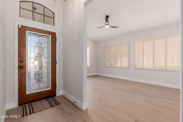 entrance foyer with ceiling fan and light wood-type flooring