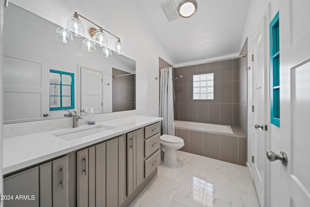 full bathroom with shower / bath combo with shower curtain, vaulted ceiling, vanity, and toilet