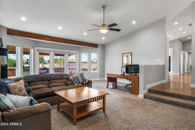 carpeted living room with lofted ceiling and ceiling fan