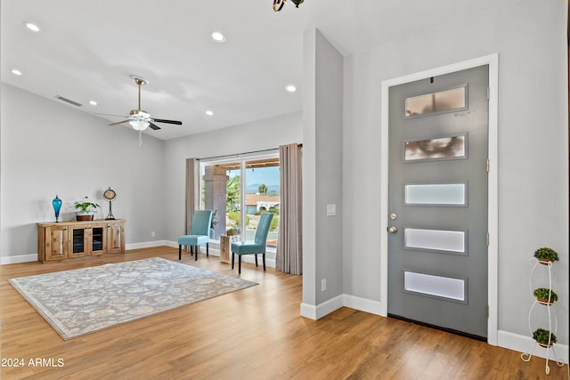 entrance foyer featuring ceiling fan and hardwood / wood-style flooring