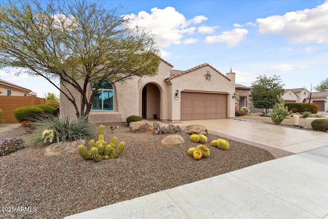 mediterranean / spanish-style house featuring a garage