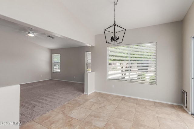1713 N Sinova, Mesa, AZ 85205 - spare room featuring baseboards, light tile patterned flooring, lofted ceiling, and ceiling fan with notable chandelier