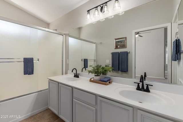 1713 N Sinova, Mesa, AZ 85205 - bathroom featuring a sink, ceiling fan, double vanity, and bath / shower combo with glass door