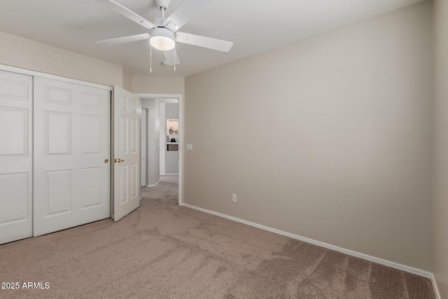 1713 N Sinova, Mesa, AZ 85205 - unfurnished bedroom featuring a closet, ceiling fan, baseboards, and carpet