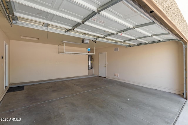 1713 N Sinova, Mesa, AZ 85205 - garage featuring water heater and a garage door opener
