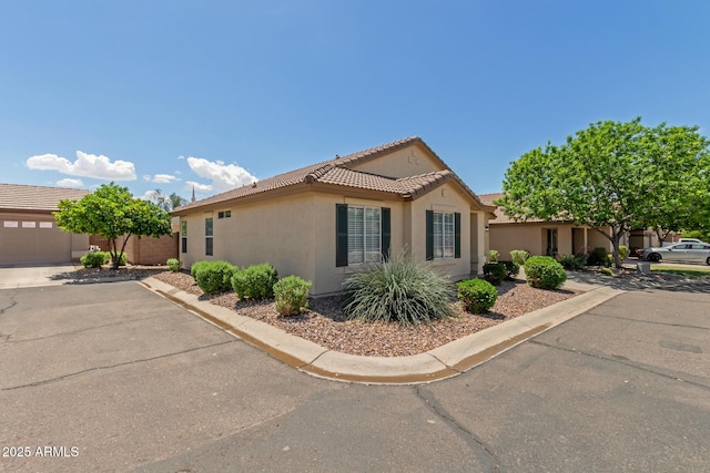 1713 N Sinova, Mesa, AZ 85205 - view of side of home featuring stucco siding, fence, and a tile roof
