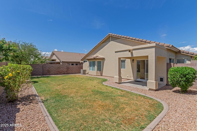 1713 N Sinova, Mesa, AZ 85205 - rear view of house featuring a patio, a yard, a fenced backyard, and stucco siding