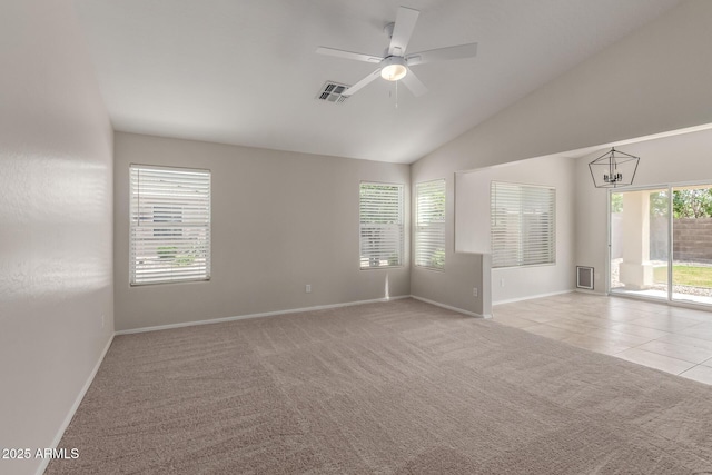 1713 N Sinova, Mesa, AZ 85205 - empty room with visible vents, baseboards, ceiling fan with notable chandelier, light colored carpet, and lofted ceiling