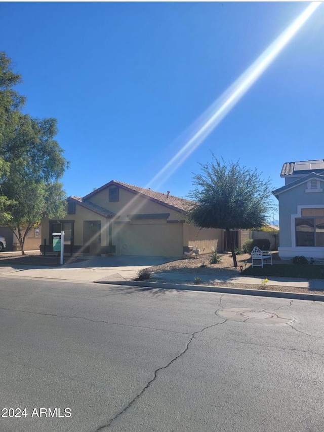 view of front of home with a garage