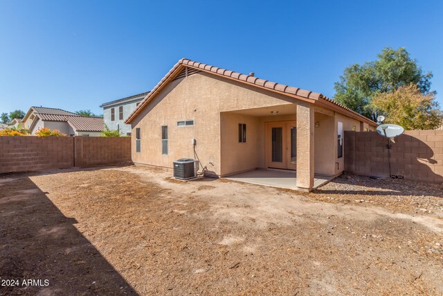 back of property featuring a patio