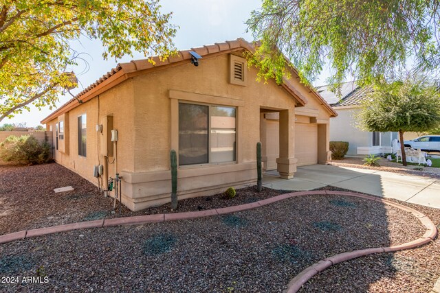 view of front of home featuring a garage