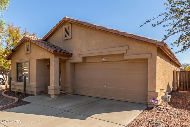 view of front of house with a garage