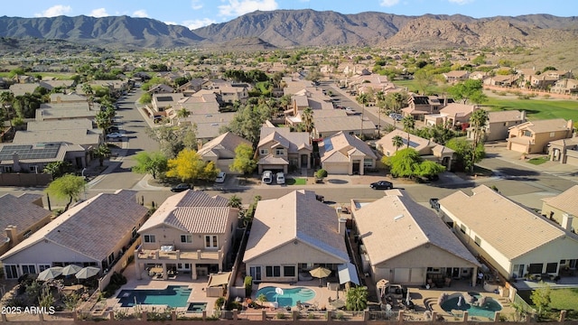 1437 E Glenhaven Dr, Phoenix, AZ 85048 - aerial perspective of suburban area featuring a pool and a mountain backdrop