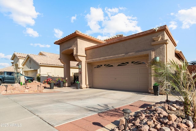 1437 E Glenhaven Dr, Phoenix, AZ 85048 - view of front facade with stucco siding, driveway, an attached garage, and a tile roof