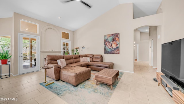 116 E Mountain Sky Ave, Phoenix, AZ 85048 - living area featuring arched walkways, high vaulted ceiling, ceiling fan, light tile patterned floors, and recessed lighting