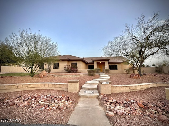 13007 W Tuckey Ct, Glendale, AZ 85307 - view of front of house featuring fence and stucco siding