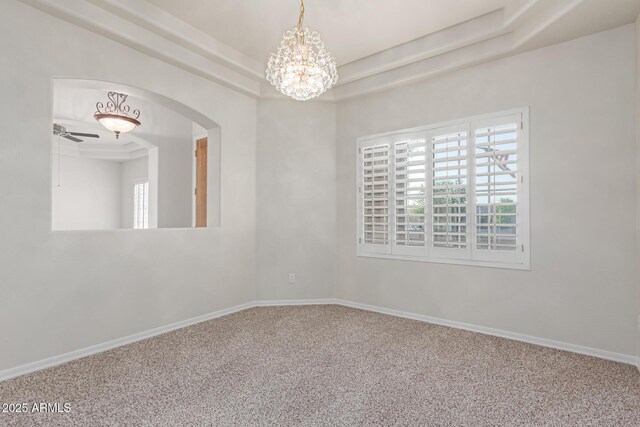 13007 W Tuckey Ct, Glendale, AZ 85307 - unfurnished room featuring carpet flooring, plenty of natural light, a chandelier, and a raised ceiling