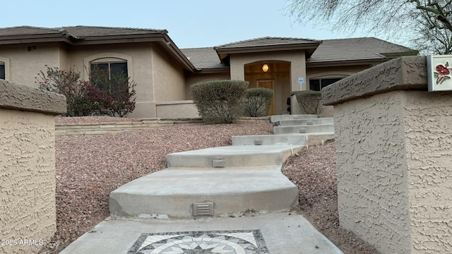13007 W Tuckey Ct, Glendale, AZ 85307 - view of front facade featuring stucco siding