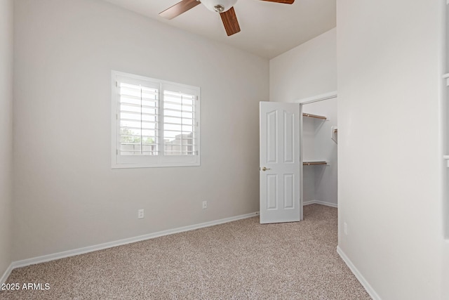 13007 W Tuckey Ct, Glendale, AZ 85307 - unfurnished bedroom featuring carpet flooring, baseboards, a spacious closet, and a ceiling fan
