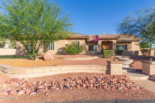13007 W Tuckey Ct, Glendale, AZ 85307 - view of front of property featuring stucco siding and fence