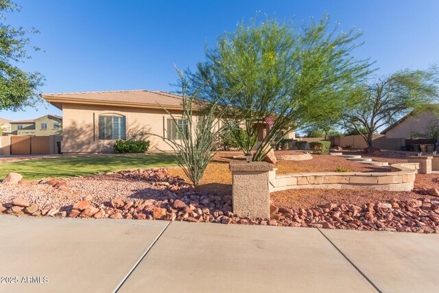 13007 W Tuckey Ct, Glendale, AZ 85307 - single story home featuring stucco siding and a patio