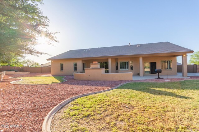 13007 W Tuckey Ct, Glendale, AZ 85307 - rear view of house featuring a patio, stucco siding, and a tiled roof