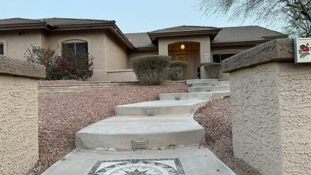 13007 W Tuckey Ct, Glendale, AZ 85307 - view of front facade featuring stucco siding