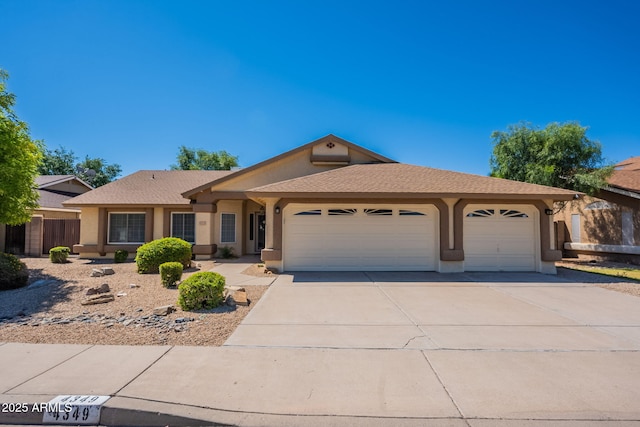 4349 W Cielo Grande, Glendale, AZ 85310 - ranch-style house with a garage, stucco siding, and concrete driveway