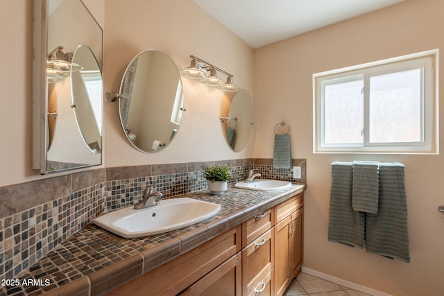 4349 W Cielo Grande, Glendale, AZ 85310 - bathroom with double vanity, tile patterned floors, and tasteful backsplash