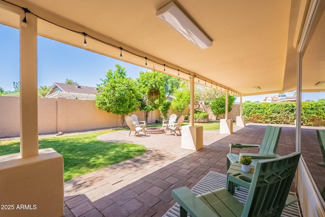 4349 W Cielo Grande, Glendale, AZ 85310 - view of patio / terrace featuring an outdoor fire pit and a fenced backyard