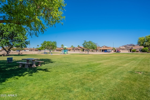 4349 W Cielo Grande, Glendale, AZ 85310 - view of home's community with a lawn and a residential view
