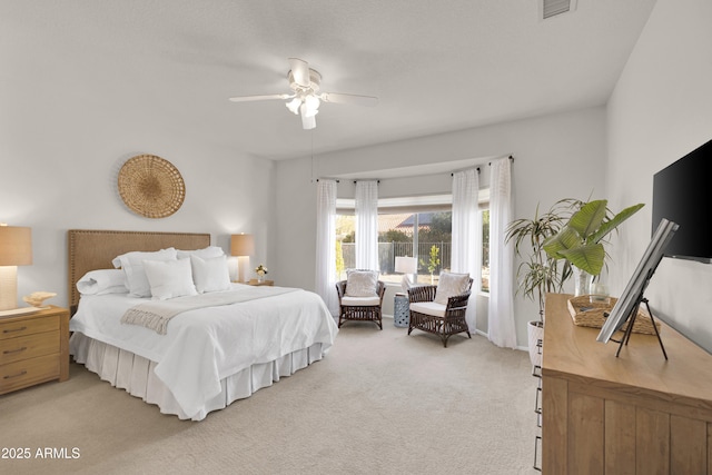 bedroom featuring ceiling fan and light colored carpet