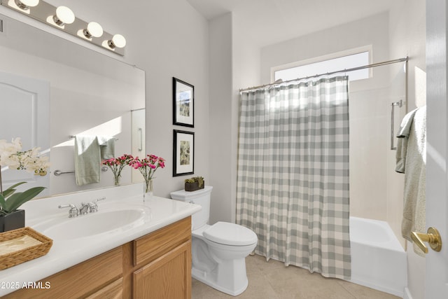 full bathroom featuring shower / bathtub combination with curtain, vanity, tile patterned flooring, and toilet