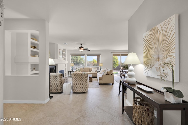 living room with ceiling fan