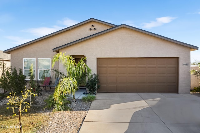 ranch-style home with a garage