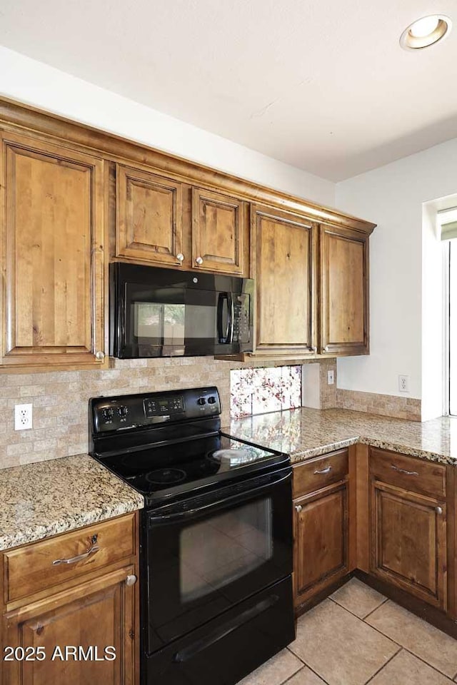 14833 S 14th Pl, Phoenix, AZ 85048 - kitchen featuring black appliances and brown cabinets