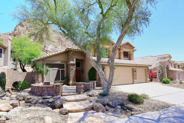 14833 S 14th Pl, Phoenix, AZ 85048 - view of front facade with fence, stucco siding, concrete driveway, and a tile roof