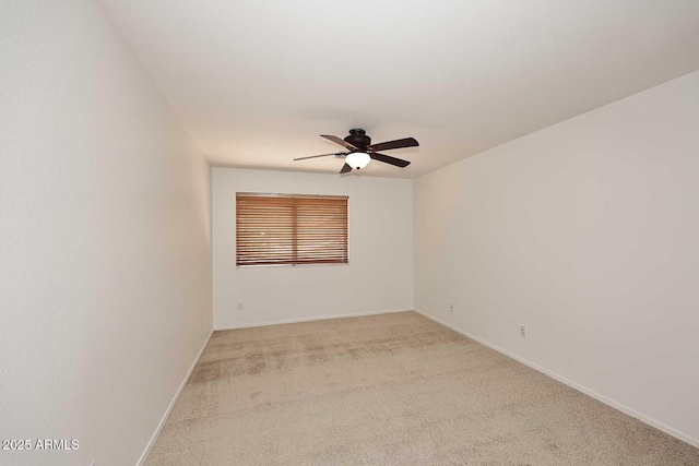 14833 S 14th Pl, Phoenix, AZ 85048 - spare room featuring a ceiling fan, baseboards, and light colored carpet