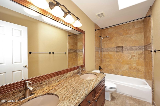 14833 S 14th Pl, Phoenix, AZ 85048 - bathroom with visible vents, a sink, toilet, and shower / washtub combination