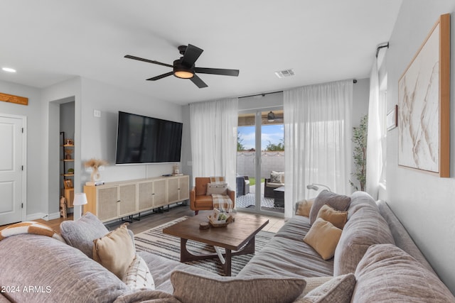 5871 N 187th Ln, Litchfield Park, AZ 85340 - living area with a ceiling fan, wood finished floors, and baseboards