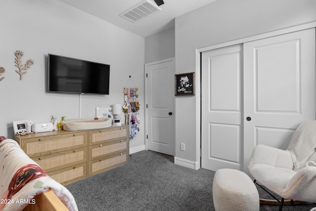 5871 N 187th Ln, Litchfield Park, AZ 85340 - bedroom with dark carpet, a closet, and baseboards