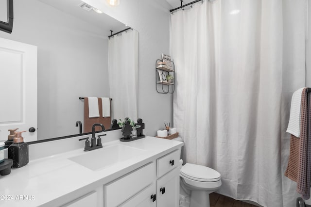 5871 N 187th Ln, Litchfield Park, AZ 85340 - bathroom with vanity, toilet, and curtained shower