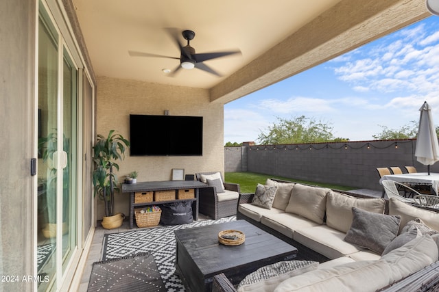 5871 N 187th Ln, Litchfield Park, AZ 85340 - fenced backyard with an outdoor hangout area and a ceiling fan