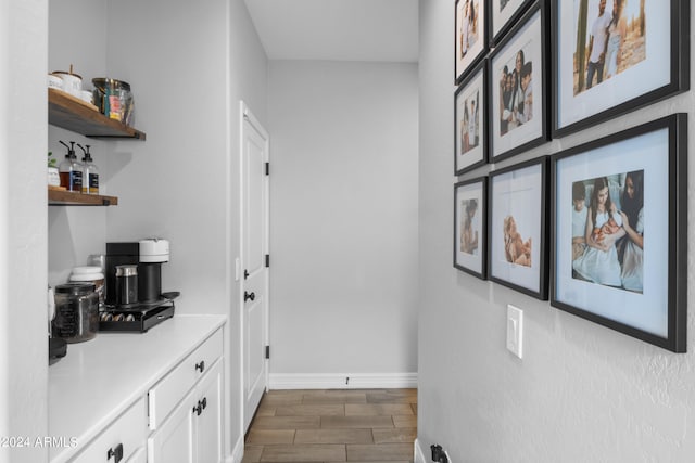 5871 N 187th Ln, Litchfield Park, AZ 85340 - bar with baseboards and wood finish floors